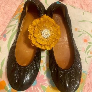 Obsidian black Tieks size 10 with flower